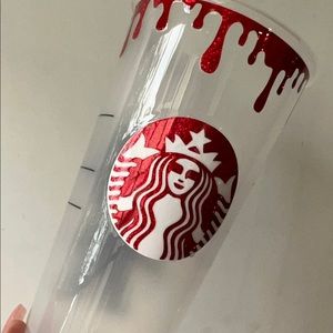 Venti sized Starbucks cold cup. Michael Myers